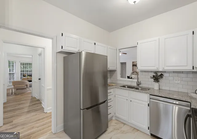Photo 4 of Townhouse for sale at 2958 Crosswycke Forest Dr NE, Brookhaven, GA 30319 | MLS# 10851653 | Listing updated on 2026-09-24