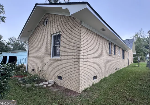 Photo 2 of Single family home for sale at 2401 W Elm St, Wrightsville, GA 31096 | MLS# 10850648 | Listing updated on 2026-10-15