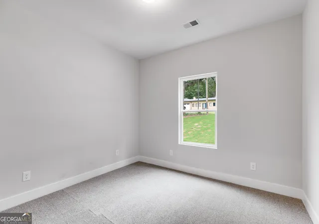 Photo 4 of Single family home for sale at 310 Colonial Dr, Carrollton, GA 30117 | MLS# 10837716 | Listing updated on 2026-10-06