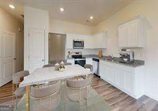 Photo 3 of Townhouse for sale at 1131 Lucienne Blvd, Auburn, GA 30011 | MLS# 10849655 | Listing updated on 2026-10-03
