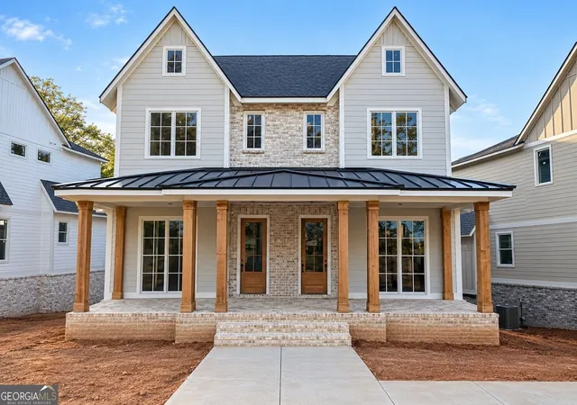 Photo 1 of Townhouse for sale at 1049 Riverside Dr, Gainesville, GA 30501 | MLS# 10842830 | Listing updated on 2026-09-10