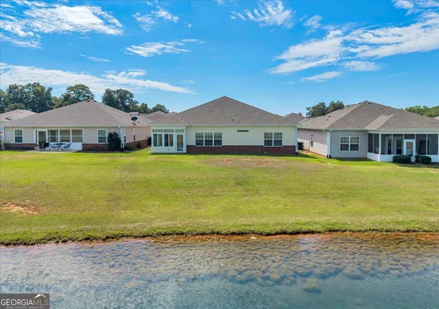 Photo 3 of Single family home for sale at 302 S Houston Springs Blvd, Perry, GA 31069 | MLS# 10849568 | Listing updated on 2026-10-01
