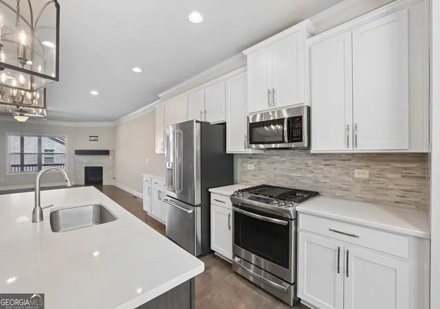 Photo 3 of Townhouse for sale at 1560 Baygreen Rd, Suwanee, GA 30024 | MLS# 10843386 | Listing updated on 2026-10-10