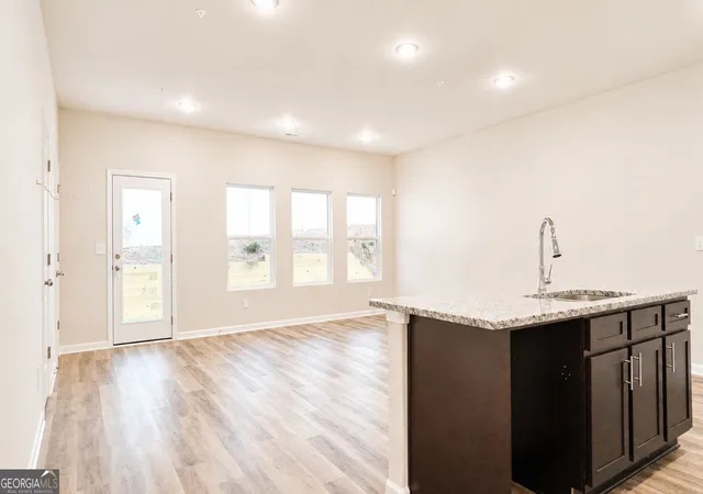 Photo 3 of Townhouse for sale at 5455 Biltmore Dr, Atlanta, GA 30349 | MLS# 10838872 | Listing updated on 2026-09-12