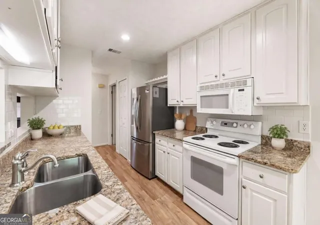 Photo 4 of Condo for sale at 18 Normandy Ct NE, Atlanta, GA 30324 | MLS# 10843759 | Listing updated on 2026-09-11