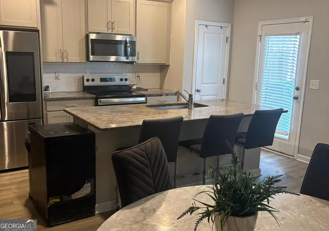 Photo 3 of Townhouse for sale at 6182 Redan Overlook, Lithonia, GA 30058 | MLS# 10849708 | Listing updated on 2026-09-22
