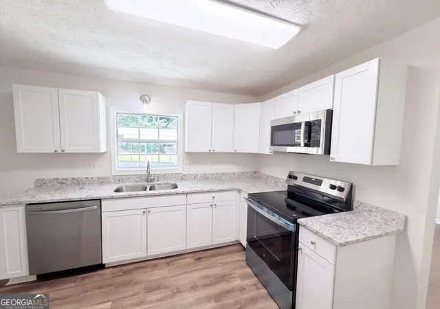 Photo 2 of Single family home for sale at 467 Oak Way, Lawrenceville, GA 30046 | MLS# 10832060 | Listing updated on 2026-09-19