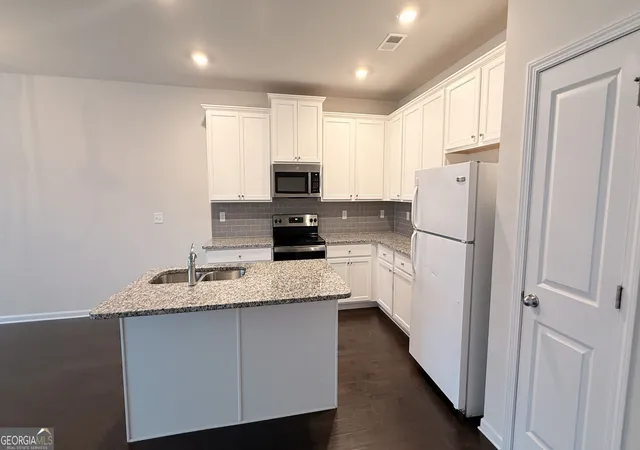 Photo 3 of Townhouse for sale at 7085 Gladstone Cir, Stonecrest, GA 30038 | MLS# 10831562 | Listing updated on 2026-09-25