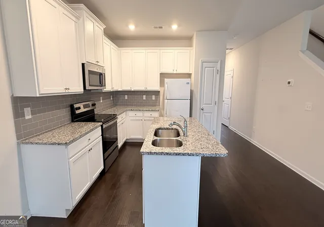 Photo 3 of Townhouse for sale at 7085 Gladstone Cir, Stonecrest, GA 30038 | MLS# 10831562 | Listing updated on 2026-09-25