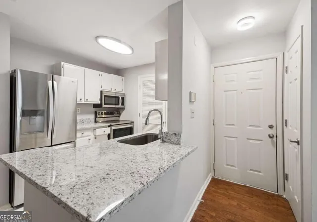 Photo 4 of Condo for sale at 305 Granville Ct, Atlanta, GA 30328 | MLS# 10837062 | Listing updated on 2026-09-20
