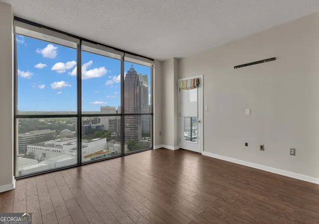 Listing Photo 1 - Condo for sale in building located at 1280 W Peachtree St Nw, Atlanta, GA 30309 - Unit #3810
