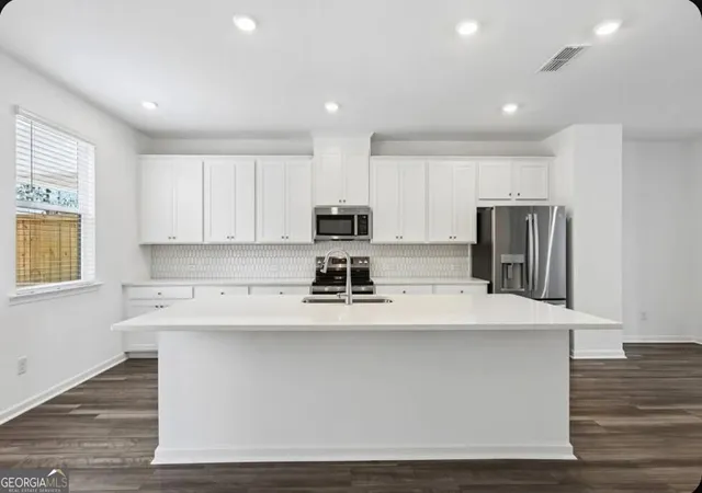 Photo 2 of Townhouse for sale at 627 Oak Blf Dr, Cumming, GA 30040 | MLS# 10847018 | Listing updated on 2026-10-06