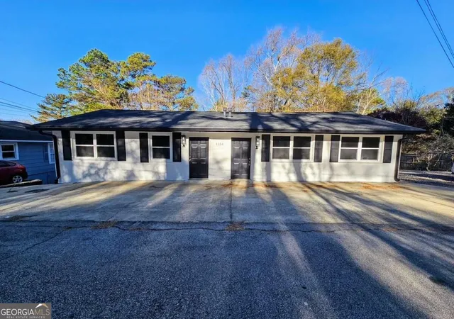 Photo 1 of Multi family home for sale at 1154 Olivet Dr, Buford, GA 30518 | MLS# 10852334 | Listing updated on 2026-10-08