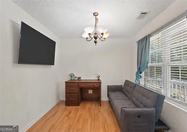 Photo 2 of Single family home for sale at 1401 Flanagan Ml Dr, Auburn, GA 30011 | MLS# 10837087 | Listing updated on 2026-09-15