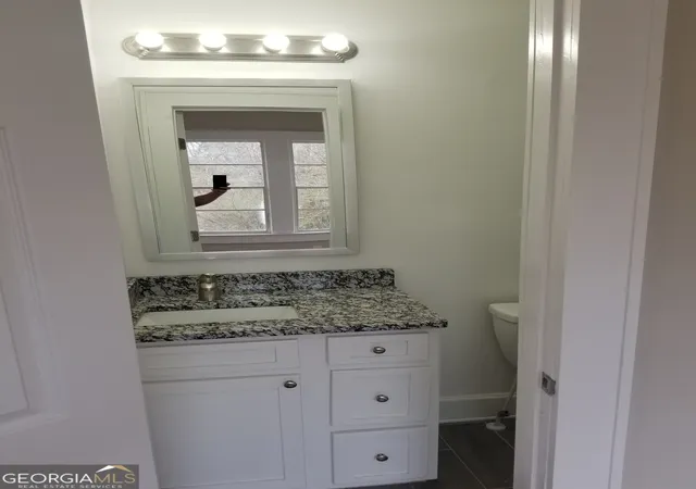 Listing Photo 2 - Condo for sale in building located at 2429 Macon Dr SW, Atlanta, GA 30315 - Unit #