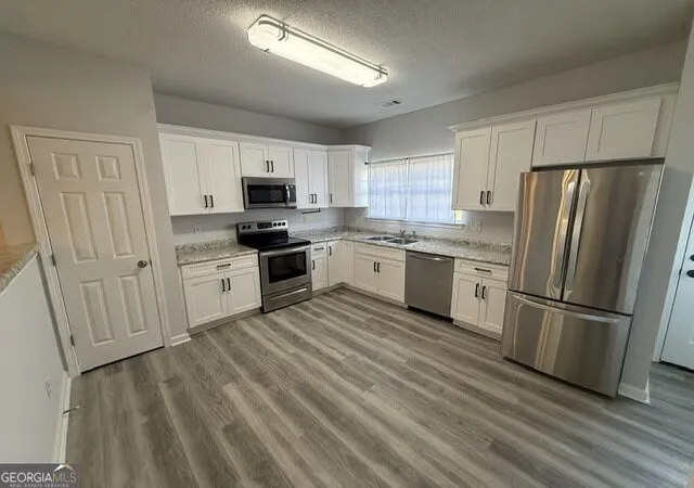Photo 2 of Townhouse for sale at 130 Hawkeye Ln, Conyers, GA 30012 | MLS# 10845659 | Listing updated on 2026-09-28