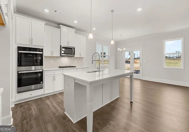 Photo 3 of Single family home for sale at 7172 Bocholt Dr, South Fulton, GA 30349 | MLS# 10840302 | Listing updated on 2026-09-08