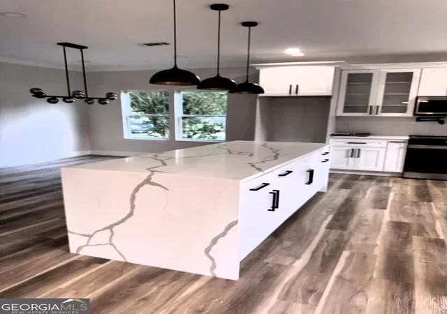 Photo 3 of Single family home for sale at 405 Norman Ct, Hampton, GA 30228 | MLS# 10851620 | Listing updated on 2026-10-07
