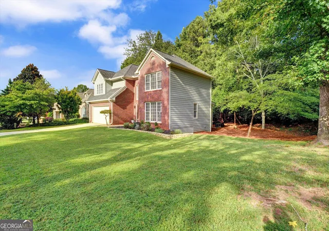 Photo 2 of Single family home for sale at 115 Glen Holly Dr, Roswell, GA 30076 | MLS# 10853526 | Listing updated on 2026-10-09