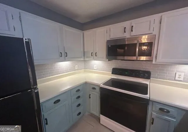 Listing Photo 1 - Condo for sale in building located at 104 Abingdon Wy, Sandy Springs, GA 30328