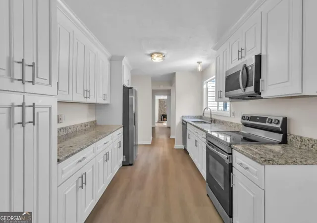 Photo 3 of Single family home for sale at 661 Bantry Ln, Stone Mountain, GA 30083 | MLS# 10847208 | Listing updated on 2026-10-02