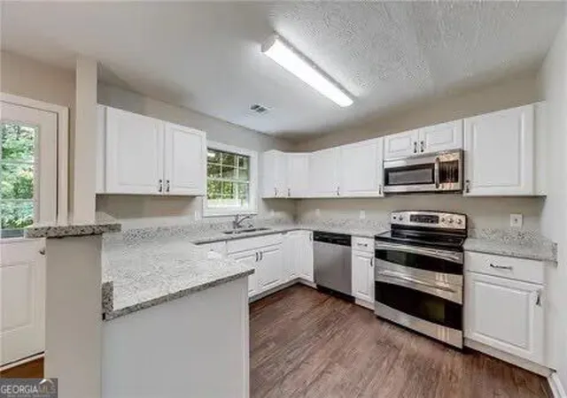 Photo 4 of Single family home for sale at 4161 Wyndham Pointe Ct, Buford, GA 30519 | MLS# 10837896 | Listing updated on 2026-09-15