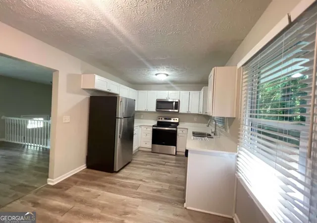 Photo 3 of Single family home for sale at 1537 Spruce Ridge Ct, Stone Mountain, GA 30083 | MLS# 10844596 | Listing updated on 2026-09-11