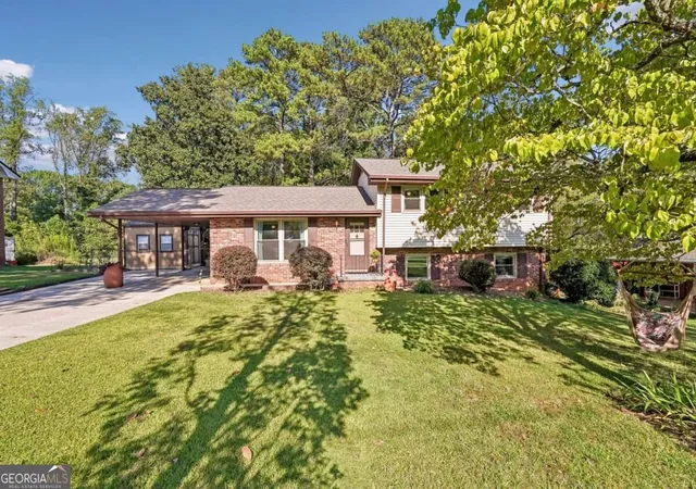 Photo 1 of Single family home for sale at 1933 Carthage Rd, Tucker, GA 30084 | MLS# 10848005 | Listing updated on 2026-10-07