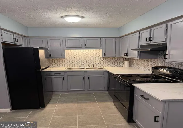 Photo 2 of Townhouse for sale at 2630 Evans Ml Dr, Lithonia, GA 30058 | MLS# 10849672 | Listing updated on 2026-09-20