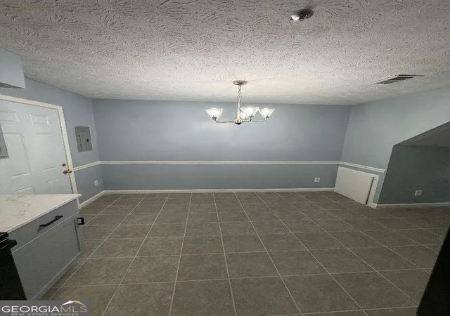 Photo 3 of Townhouse for sale at 2630 Evans Ml Dr, Lithonia, GA 30058 | MLS# 10849672 | Listing updated on 2026-09-20