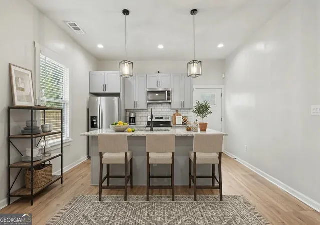 Photo 3 of Single family home for sale at 31 Mildred Pl Nw, Atlanta, GA 30318 | MLS# 10848091 | Listing updated on 2026-09-18