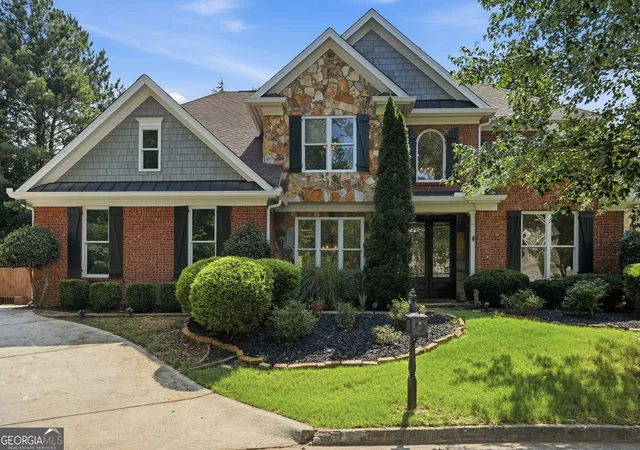 Photo 2 of Single family home for sale at 1335 Whisper Cove Dr, Buford, GA 30518 | MLS# 10810829 | Listing updated on 2026-09-11