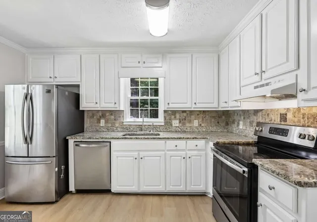 Photo 2 of Single family home for sale at 2344 Sawmill Rd SW, Marietta, GA 30064 | MLS# 10851522 | Listing updated on 2026-10-18