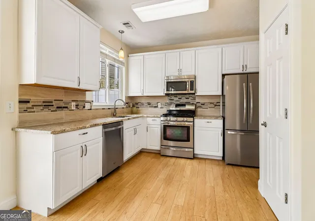 Photo 3 of Single family home for sale at 213 W Oaks Pl, Woodstock, GA 30188 | MLS# 10839351 | Listing updated on 2026-10-02
