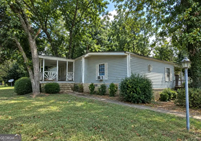 Photo 2 of Manufactured home for sale at 810 Steele Dr, Hampton, GA 30228 | MLS# 10841237 | Listing updated on 2026-09-08
