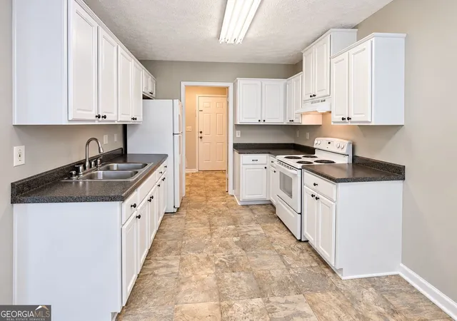 Photo 3 of Single family home for sale at 310 Freeport Dr, Lawrenceville, GA 30046 | MLS# 10842996 | Listing updated on 2026-09-10