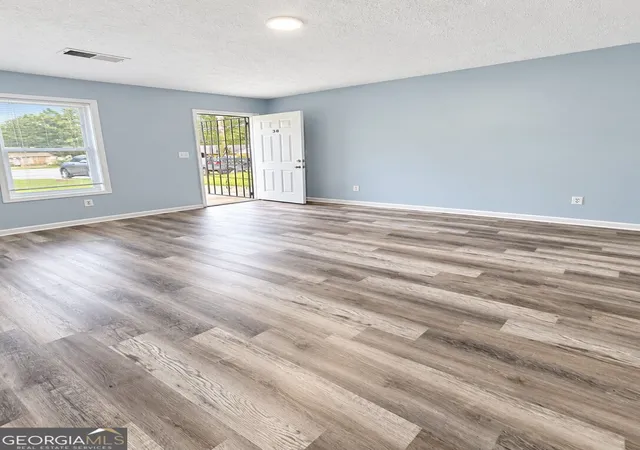 Photo 4 of Single family home for sale at 310 Freeport Dr, Lawrenceville, GA 30046 | MLS# 10842996 | Listing updated on 2026-09-10