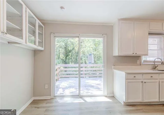 Photo 2 of Single family home for sale at 927 Magna Carta Dr Nw, Atlanta, GA 30318 | MLS# 10852236 | Listing updated on 2026-09-24