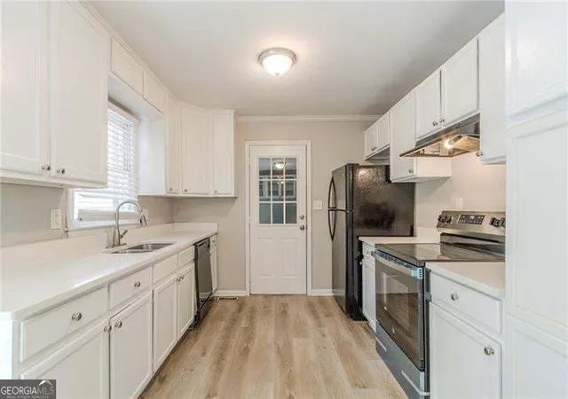 Photo 3 of Single family home for sale at 927 Magna Carta Dr Nw, Atlanta, GA 30318 | MLS# 10852236 | Listing updated on 2026-09-24