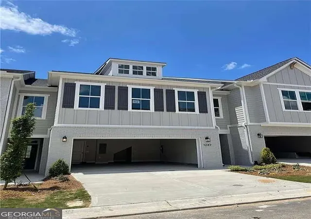 Photo 1 of Townhouse for sale at 1247 Winterhaven Dr, Cumming, GA 30041 | MLS# 10850409 | Listing updated on 2026-10-09