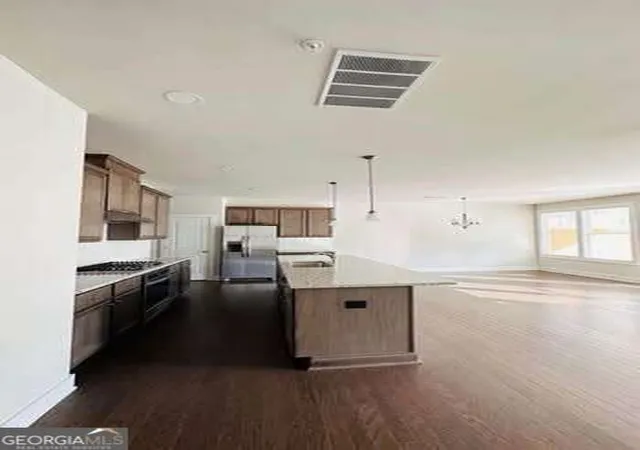 Photo 3 of Townhouse for sale at 1247 Winterhaven Dr, Cumming, GA 30041 | MLS# 10850409 | Listing updated on 2026-10-09