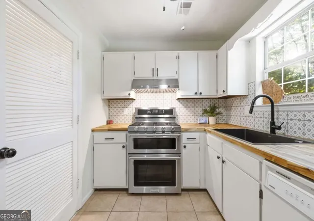 Photo 1 of Townhouse for sale at 1556 Cedar Blf Trl, Marietta, GA 30062 | MLS# 10843448 | Listing updated on 2026-09-10