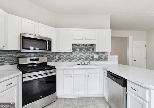 Photo 1 of Townhouse for sale at 409 Timber Gate Dr, Lawrenceville, GA 30045 | MLS# 10872658 | Listing updated on 2026-10-28