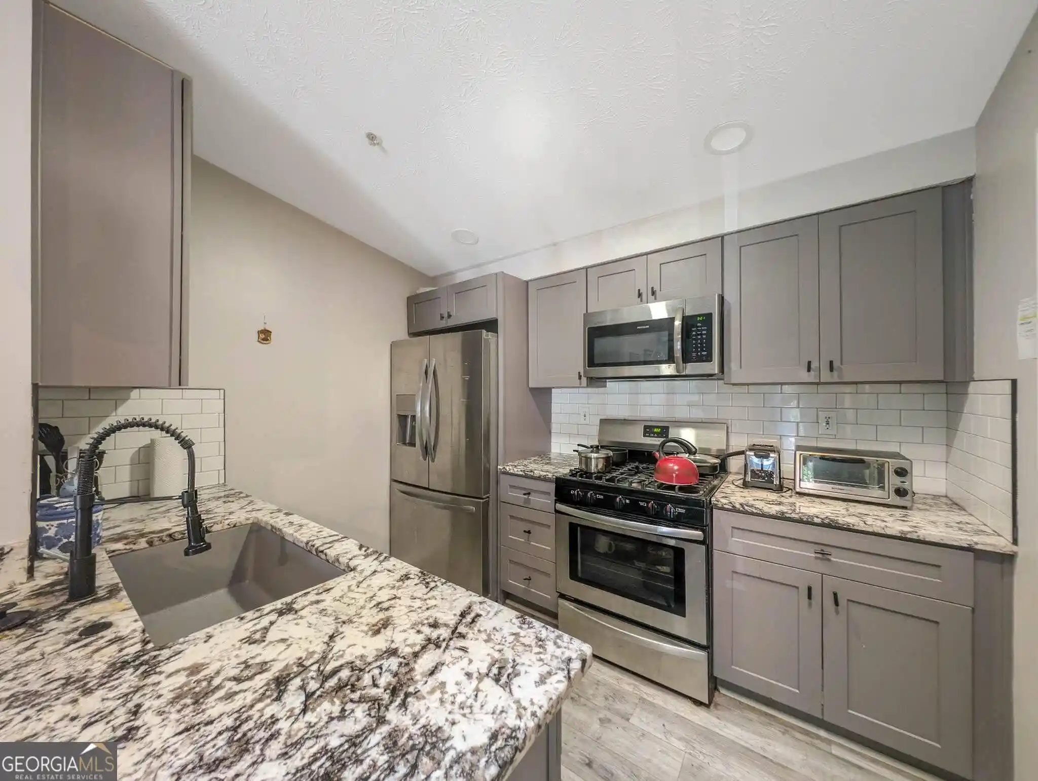 Listing Photo 2 - Condo for sale in 1474 Kys Xing Dr NE located at 1474 Kys Xing Dr NE, Brookhaven, GA 30319 - Unit 1474 Keys Xing Dr NE