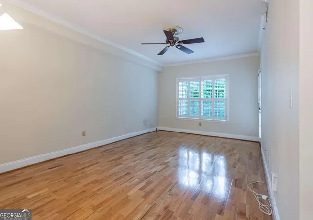 Listing Photo 1 - Condo for sale in building located at 1075 Peachtree Walk Ne, Atlanta, GA 30309 - Unit #A205