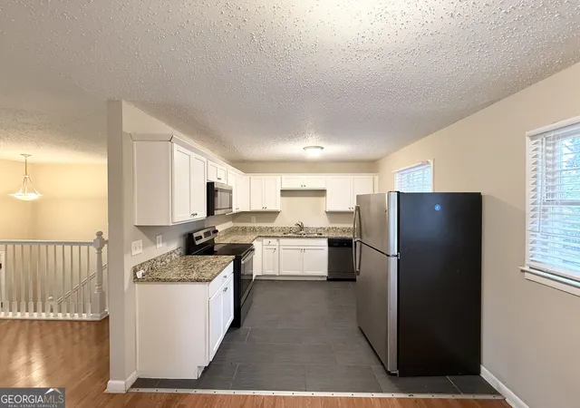 Photo 3 of Single family home for sale at 2946 Carriage Ln, Atlanta, GA 30349 | MLS# 10830637 | Listing updated on 2026-09-04