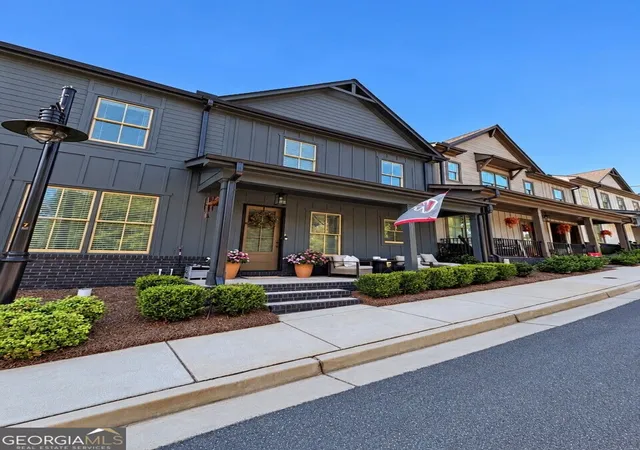 Photo 1 of Townhouse for sale at 5611 Pine St, Flowery Branch, GA 30542 | MLS# 10847398 | Listing updated on 2026-09-30