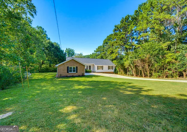 Photo 2 of Single family home for sale at 1691 Bentwood Dr Sw, Lilburn, GA 30047 | MLS# 10833903 | Listing updated on 2026-09-27