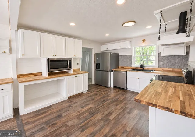 Photo 2 of Single family home for sale at 310 Cavalier Rd, Athens, GA 30606 | MLS# 10843969 | Listing updated on 2026-09-11