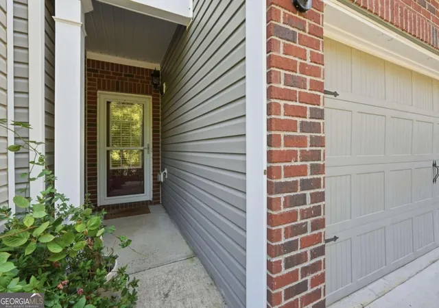 Photo 3 of Townhouse for sale at 1250 Rubble Rd, Cumming, GA 30040 | MLS# 10841790 | Listing updated on 2026-09-08